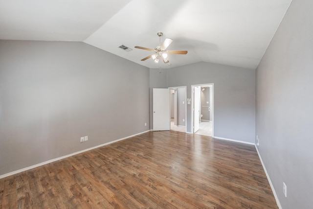 unfurnished bedroom featuring vaulted ceiling, ceiling fan, dark hardwood / wood-style flooring, and ensuite bath