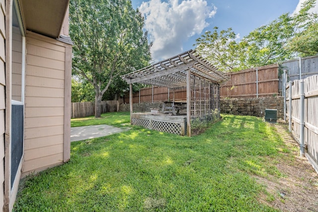 view of yard with a pergola and a patio area