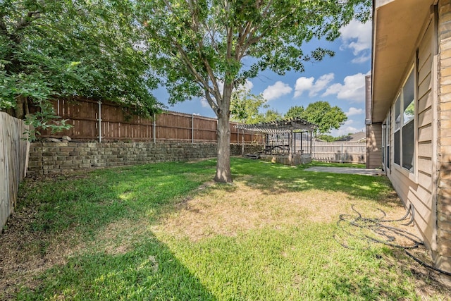 view of yard with a pergola