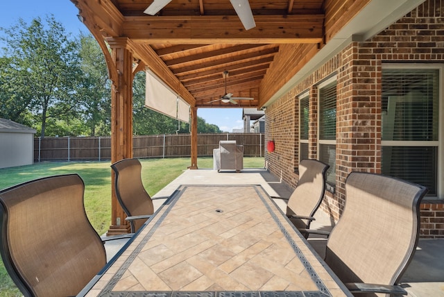 view of patio featuring ceiling fan