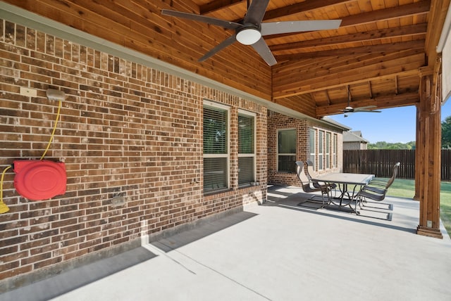 view of patio featuring ceiling fan