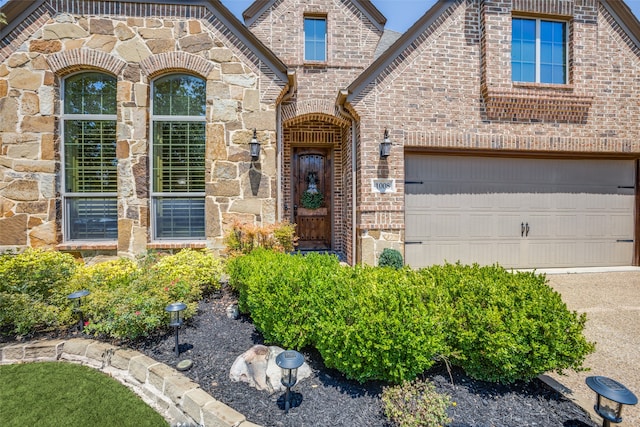 view of front of property with a garage