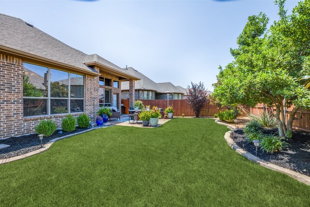 view of yard with a patio area