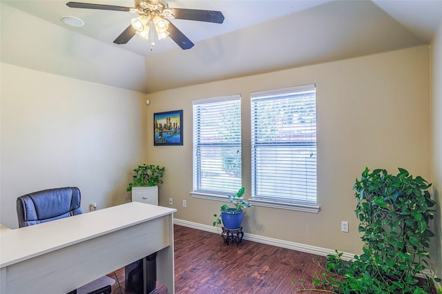 home office with vaulted ceiling, ceiling fan, dark wood finished floors, and baseboards