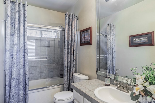 full bathroom with vanity, toilet, and shower / bathtub combination with curtain