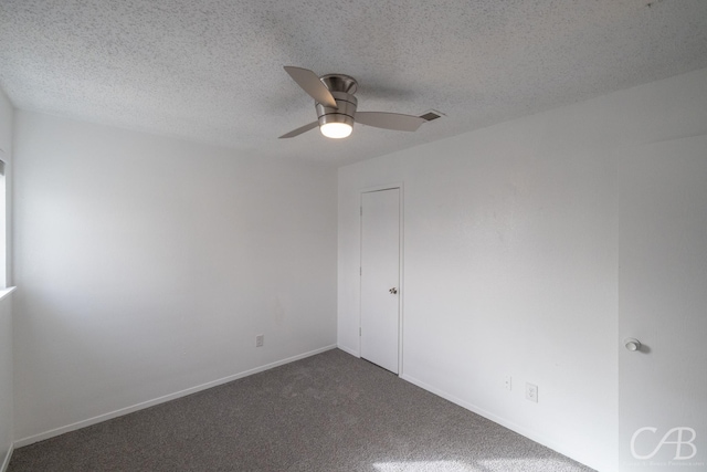 unfurnished room featuring ceiling fan, a textured ceiling, and carpet flooring