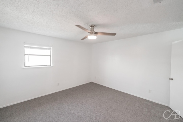 unfurnished room with a textured ceiling, ceiling fan, and carpet floors