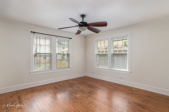 unfurnished room with ornamental molding, hardwood / wood-style floors, and ceiling fan