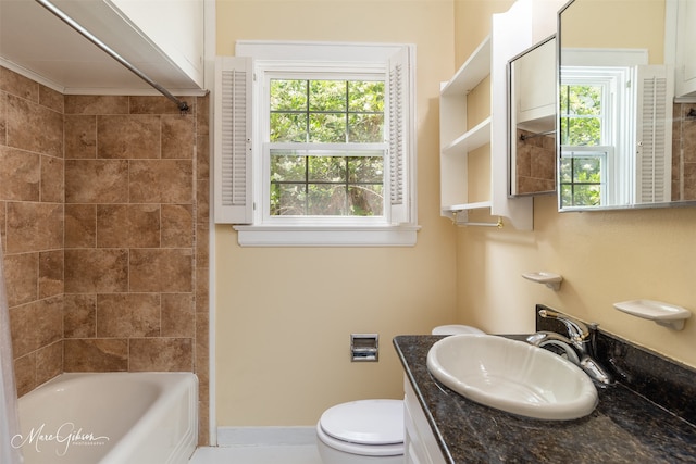 full bathroom featuring shower / bathtub combination, vanity, and toilet