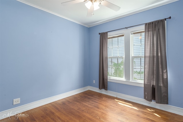 spare room with ornamental molding, ceiling fan, and hardwood / wood-style floors