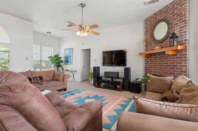 living room with ceiling fan and light colored carpet