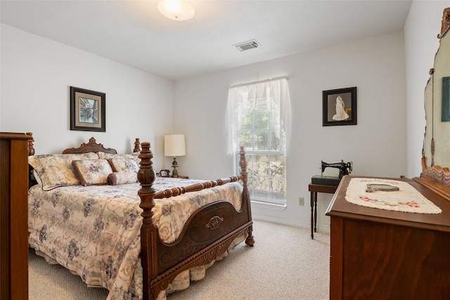 bedroom with light carpet