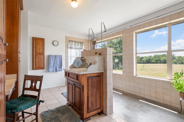 kitchen with sink and light tile patterned floors