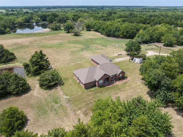 birds eye view of property with a rural view and a water view