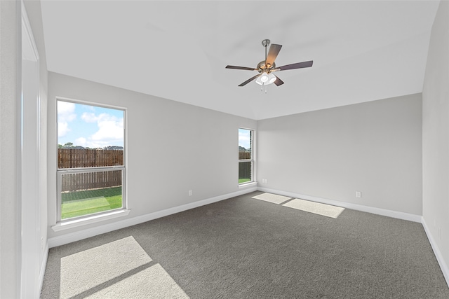 carpeted empty room featuring ceiling fan