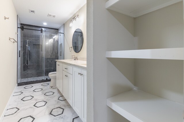 bathroom featuring toilet, walk in shower, and vanity