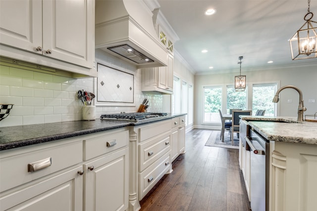 kitchen featuring stainless steel appliances, backsplash, white cabinetry, dark wood-type flooring, and custom range hood