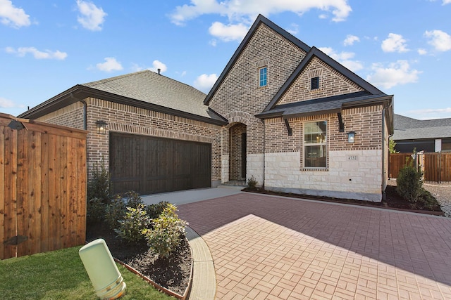 view of front of property featuring a garage