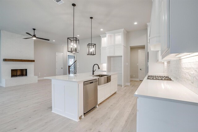 unfurnished dining area featuring a notable chandelier and light wood-type flooring