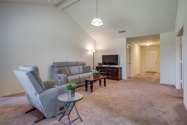 living room with high vaulted ceiling, beamed ceiling, and light colored carpet