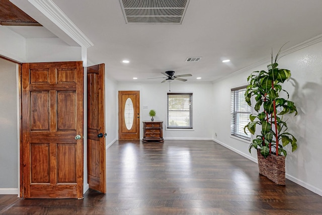 unfurnished living room featuring crown molding, dark hardwood / wood-style flooring, and ceiling fan