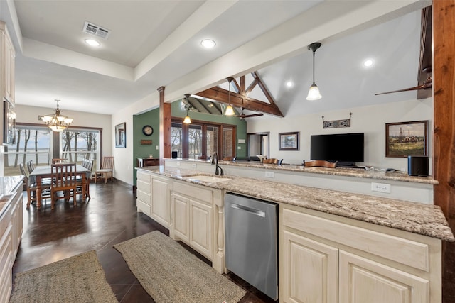 kitchen featuring light stone countertops, sink, dishwasher, and a healthy amount of sunlight