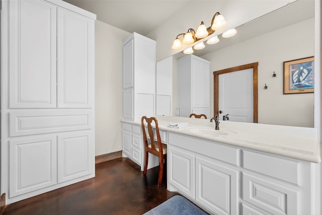 bathroom with concrete flooring and vanity