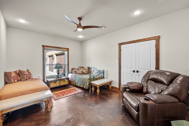 tiled bedroom featuring ceiling fan