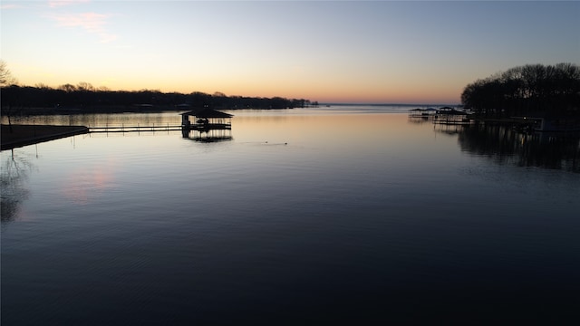 water view featuring a dock