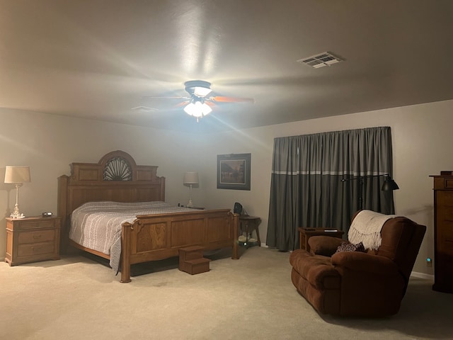 bedroom with light colored carpet and ceiling fan