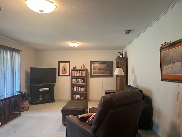 living room featuring carpet floors and crown molding