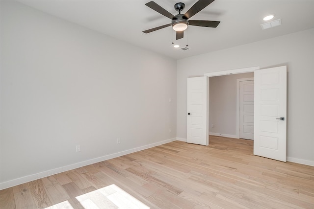 unfurnished bedroom featuring light hardwood / wood-style flooring and ceiling fan