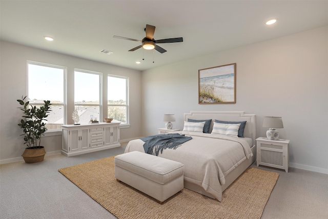 carpeted bedroom with ceiling fan