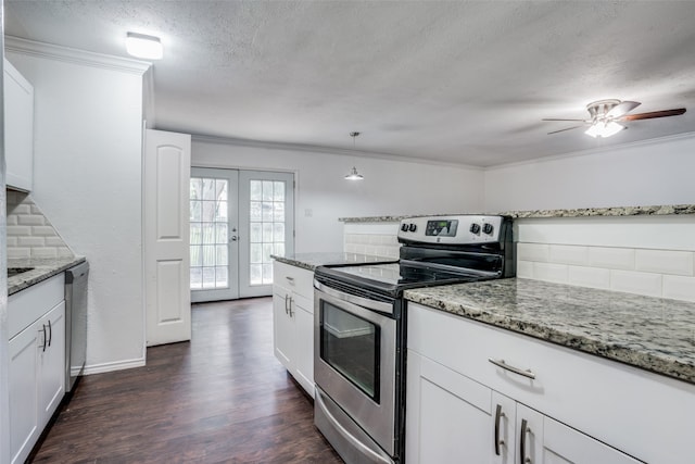 kitchen featuring stainless steel electric stove, white cabinets, and dark hardwood / wood-style floors