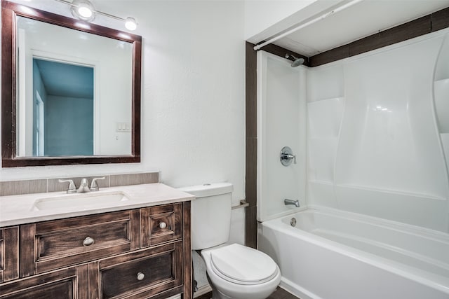 full bathroom featuring vanity, tub / shower combination, and toilet