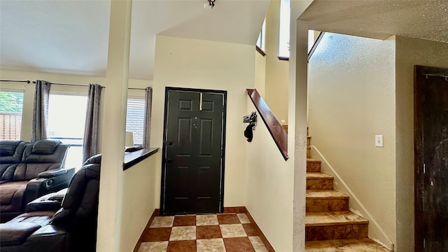 foyer featuring tile patterned floors