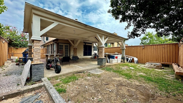 back of house featuring a patio area