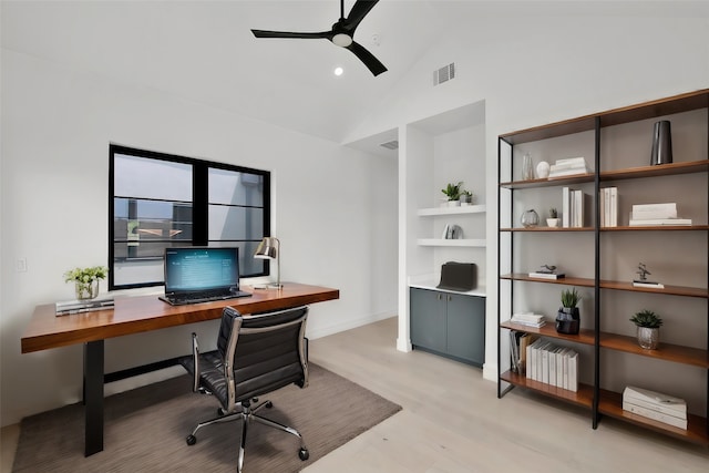 office area with ceiling fan, light hardwood / wood-style flooring, and vaulted ceiling