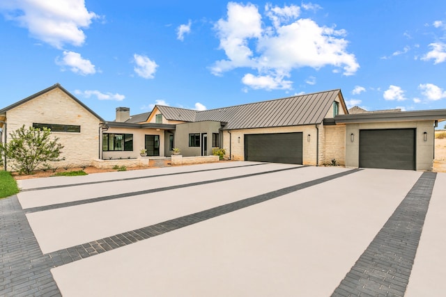 view of front of home featuring a garage