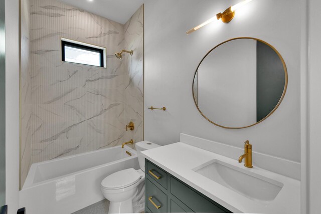 full bathroom featuring vanity, tiled shower / bath combo, and toilet