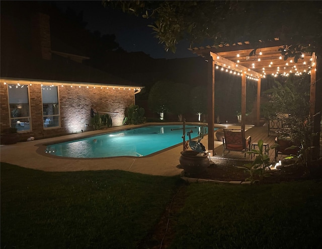 pool at twilight with a pergola and a lawn