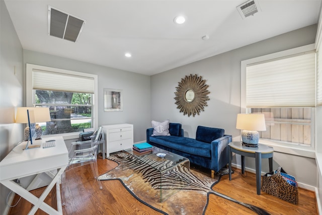 home office featuring hardwood / wood-style floors