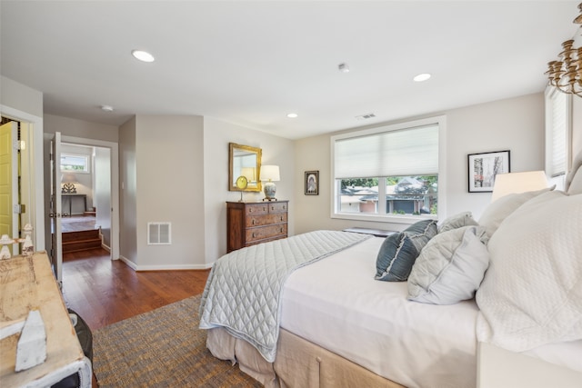 bedroom featuring dark wood-type flooring