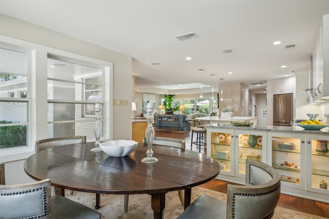 dining room with light hardwood / wood-style flooring