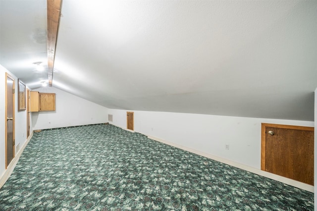 bonus room featuring carpet floors and lofted ceiling