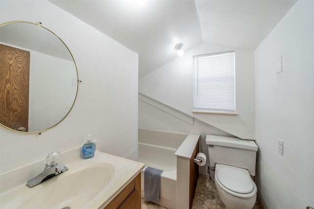 bathroom featuring a washtub, vaulted ceiling, vanity, and toilet