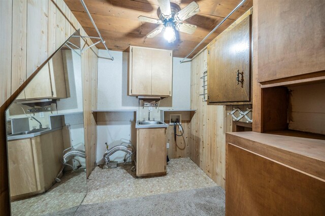 interior space featuring cabinets and ceiling fan