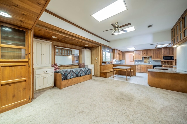 bedroom featuring light carpet