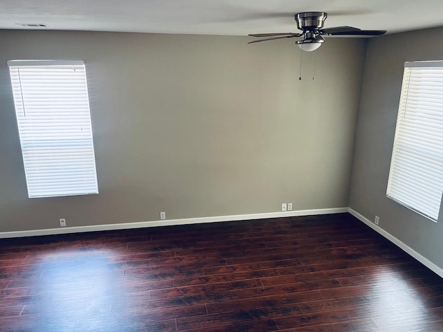 spare room with ceiling fan and hardwood / wood-style floors