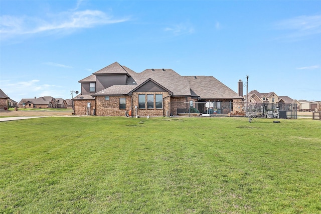 view of front of home featuring a front lawn